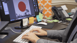 Office worker typing on computer